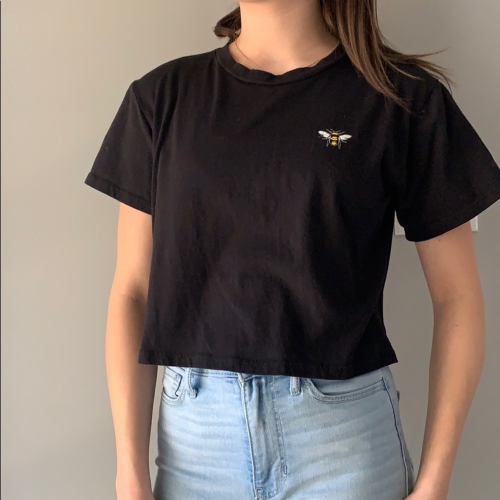 Black semi cropped tee with “save the bees” logo